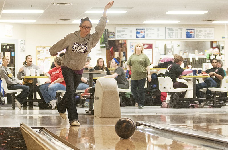 Tabatha Bryan of Holts Summit watches her bowling ball roll down a land Wednesday night at the Fulton Bowling Center. The bowling complex will host two major tournaments coming up in March and April.