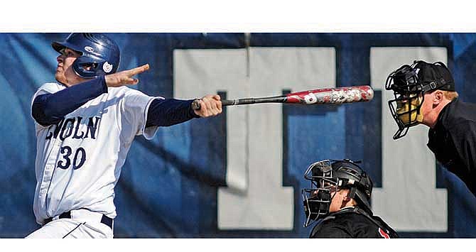 Adam Stegeman of Lincoln watches the ball after connecting on a swing during Saturday's action against Central Missouri at Lincoln Field.