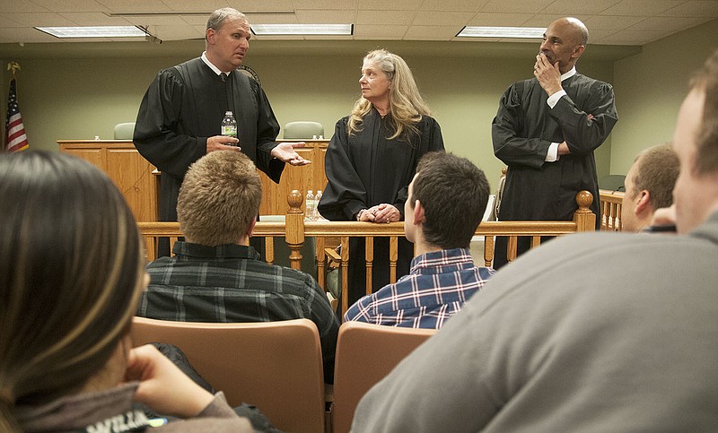 Western District Court of Appeals judges Mark Pfeiffer, Cynthia Martin and Thomas Newton, presiding, answer questions from William Woods University and Westminster College students Wednesday inside William Wood's model courtroom. The Western District Court of Appeals heard five cases at William Woods as a way to engage students in the judicial and appellate process.