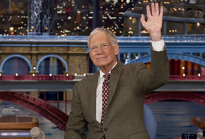 David Letterman, host of the Late Show with David Letterman, waves to the audience in New York on Thursday after announcing that he will retire sometime in 2015. Letterman, who turns 67 next week, has the longest tenure of any late-night talk show host in U.S. television history, already marking 32 years since he created "Late Night" at NBC in 1982.