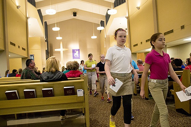 In this April 2014 photo, Trinity Lutheran students attend the first service in the renovated worship area. 