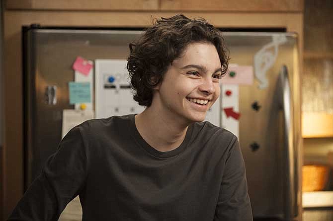 This image released by NBC shows Max Burkholder as Max Braverman from the series, "Parenthood,"airing Thursdays at 10 p.m. EST on NBC.