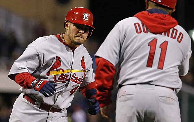 Yadier Molina pitches for Cardinals against Pirates