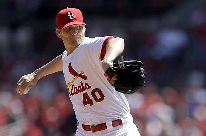 St. Louis Cardinals starting pitcher Shelby Miller throws during the first inning of a baseball game against the Cincinnati Reds Wednesday, April 9, 2014, in St. Louis. 