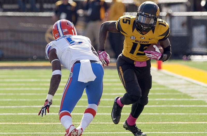 Missouri wide receiver Dorial Green-Beckham (15), shown trying to elude Florida defensive back Marcus Roberson during a game last season in Columbia, will not be charged in a burglary case.