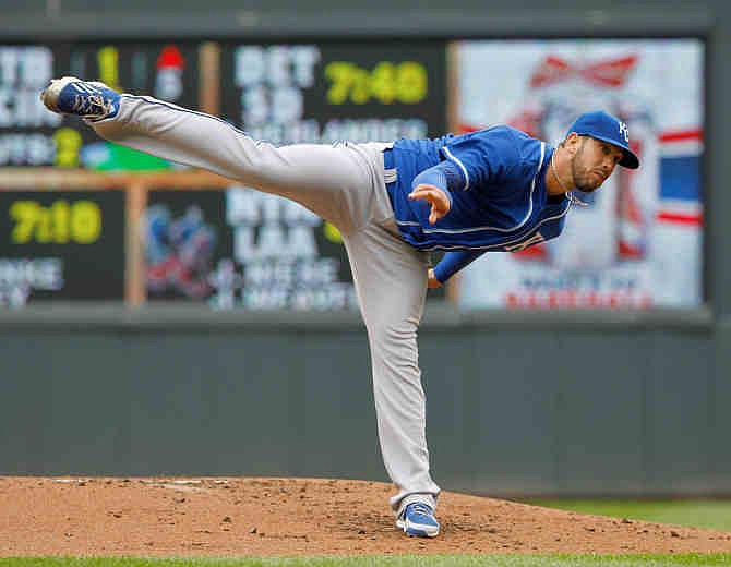 Kansas City Royals starting pitcher James Shields follows through with a pitch during the first inning of a baseball game agains the Minnesota Vikings in Minneapolis, Saturday, April 12, 2014.