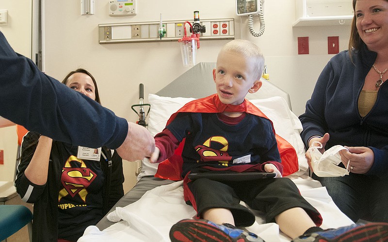 Sam Santhuff, 5, of Fulton was diagnosed with rhabdomyosarcoma in August 2013 and is continuing his quest to "kick cancer's butt." "Super Sam" supporters have continuously made fundraising efforts since learning of his diagnosis.