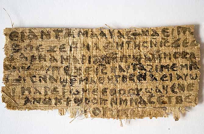 This Sept. 5, 2012 file photo released by Harvard University shows a fragment of papyrus that divinity professor Karen L. King said is the only existing ancient text that quotes Jesus explicitly referring to having a wife. An article published in the Harvard Theological Review on Thursday, April 10, 2014, said new scientific tests suggest the fragment is more likely an ancient document than a forgery. King, an expert in the history of Christianity, said the papyrus probably dates to eighth-century Egypt based on carbon dating tests and tests on the ink's chemical composition.