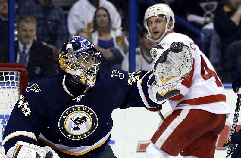 Blues goalie Ryan Miller, shown making a glove save during Sunday's game with the Red Wings in St. Louis, will need to improve upon his recent play if the team is going to make a deep run in the Stanley Cup playoffs.