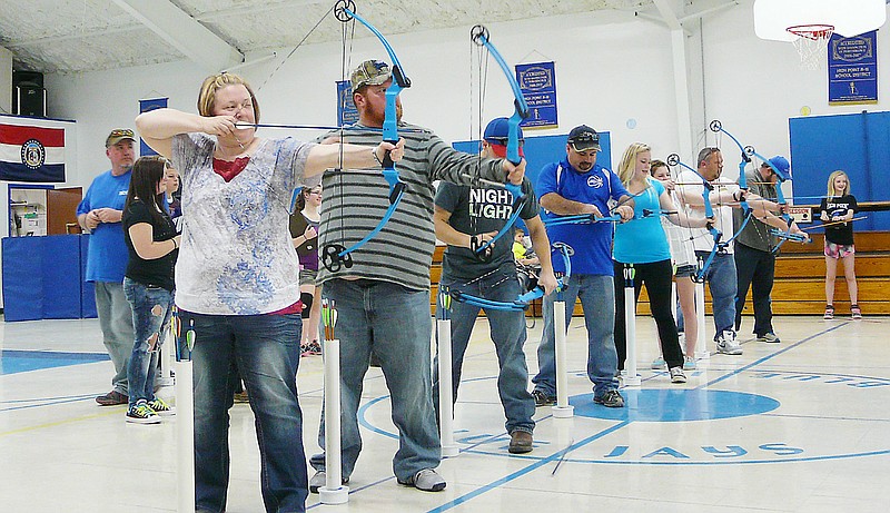 Nine people shot bows and arrows during the Famiy Fun Night at High Point, Saturday, April 5.