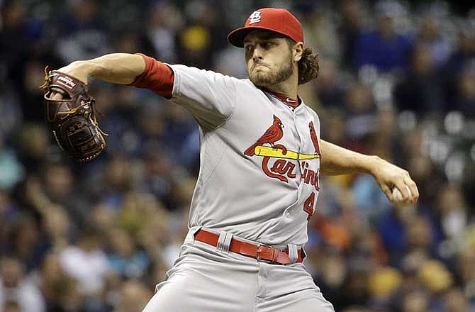 St. Louis Cardinals relief pitcher Kevin Siegrist throws during the ninth inning of a baseball game against the Milwaukee Brewers Tuesday, April 15, 2014, in Milwaukee.