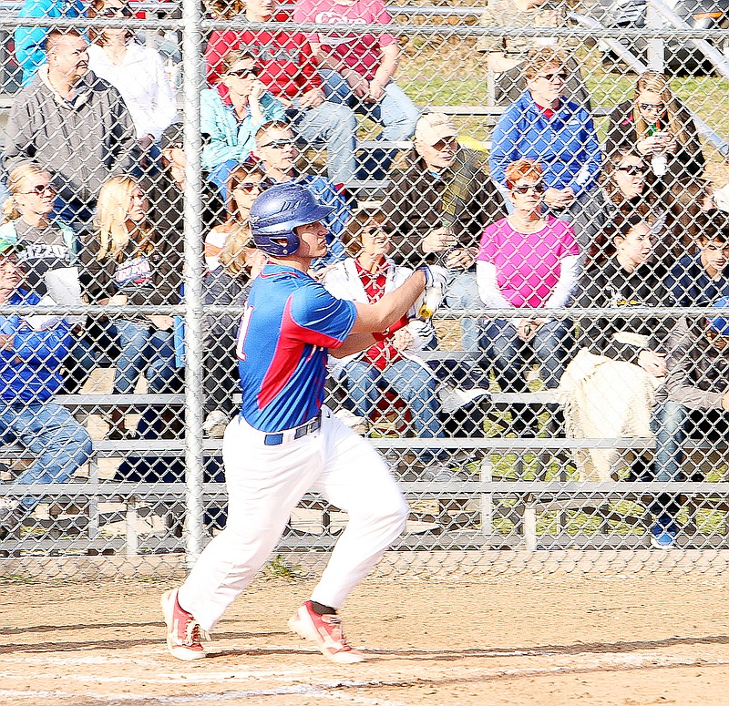 California's Jaden Barr connects with a pitch during the second inning of the varsity game against Tipton April 7 at the California Sports Complex to record his second home run of the night. The Pintos defeated the Cardinals 15-10. 