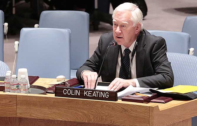 In this photo provided by the United Nations, former New Zealand ambassador Colin Keating addresses an open session of the United Nations Security Council at United Nations Headquarters, Wednesday, April 16, 2014. Keating, who was president of the Security Council in April 1994, apologized Wednesday for the council's refusal to recognize that genocide was taking place in Rwanda and for doing nothing to halt the slaughter of more than one million people.
