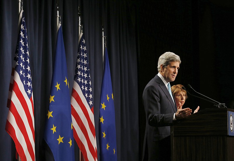 Secretary of State John Kerry, accompanied by European Union High Representative Catherine Ashton, speaks to the media after attending a quadrilateral meeting between representatives of the US, Ukraine, Russia and the European Union about the ongoing situation in Ukraine, Thursday, April 17, 2014, in Geneva. Top diplomats from the US, European Union, Russia and Ukraine reached agreement after marathon talks Thursday on immediate steps to ease the crisis in Ukraine.