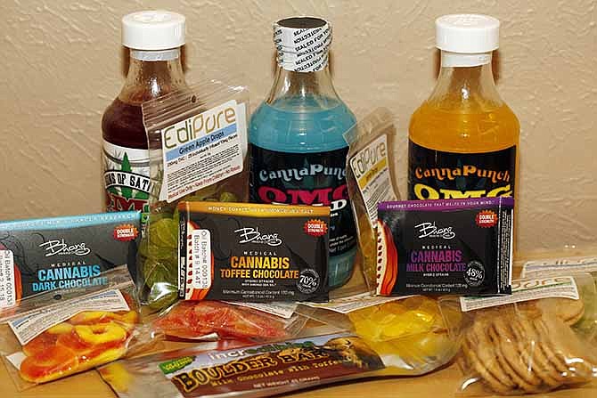 Edible marijuana products are pictured on display at a medical marijuana dispensary in Denver on Friday, April 18, 2014. Many of the items are far more potent than a single marijuana joint. Two recent deaths have raised concerns about Colorado's recreational marijuana industry and the effects of the drug, especially since cookies, candy and other pot edibles can be exponentially more potent than a smoked joint.