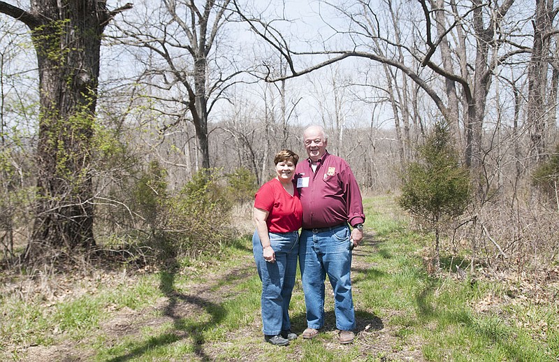 Margie and Bill Haag of Washington, Mo. stand for a photo on their 1,100-acre Portland tree farm Saturday. The couple was honored with the Tree Farmer of the Year Award from the Missouri Department of Conservation for their efforts in tree production, wildlife preservation and education.