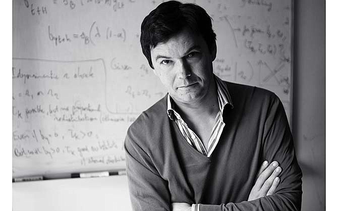 This undated photo provided by Harvard Press shows French economist Thomas Piketty. In his new book, Piketty, who helped popularize the notion of a privileged 1 percent, sounds a grim warning: The U.S. economy is beginning to decay into the aristocratic Europe of the 19th century. 
