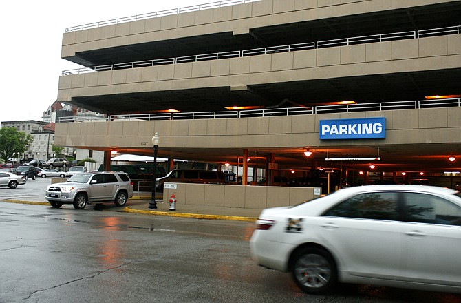 This News Tribune file photo shows the Madison Street entrance of the city parking garage.