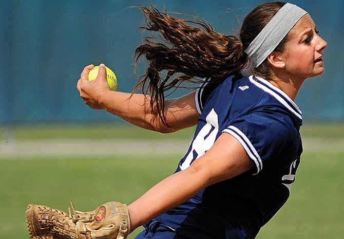 Lincoln reliever Madison Gooden delivers a pitch during the first game of Saturday's doubleheader with Emporia State at Lincoln Field.