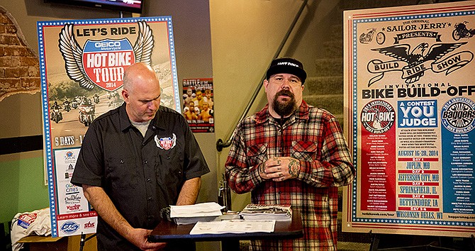 Hot Bike magazine representatives Corey Eastman, left, and Jeff Holt speak at a press conference at Spectators on Tuesday about the upcoming Hot Bike tour that will stop in Jefferson City in mid-August. 