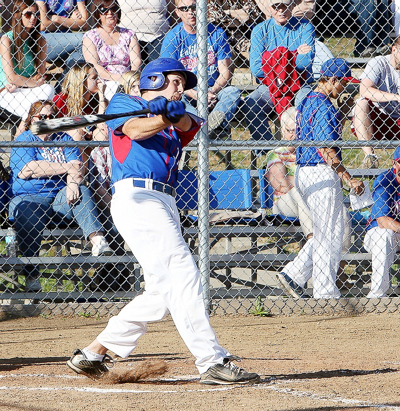Randy Allee connects with a pitch to produce a single that drives Austin Gump home in the second inning of the varsity game against Eldon April 22 at the California Sports Complex. This was the first run of the night for the Pintos.  
