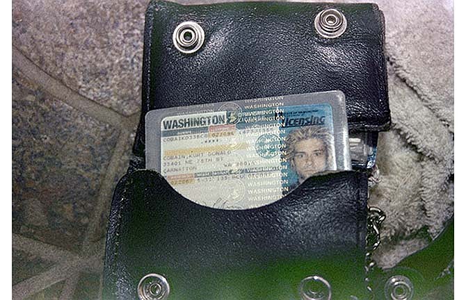 This April 1994 photo from the Seattle Police Department shows a wallet containing Kurt Cobain's Washington state driver's license, found at the scene of his suicide, in Seattle.