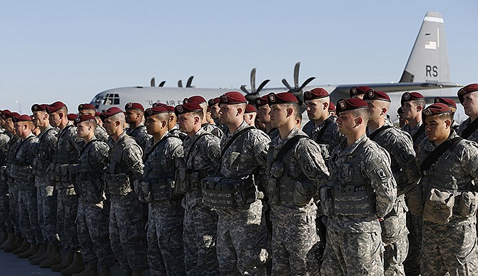 Members of the U.S. Army 173rd Airborne Brigade attend a welcome ceremony upon their arrival at a Lithuanian air force base in Siauliai, Lithuania. US troops arrived Saturday in Lithuania to participate in NATO maneuvers, at a time of increased tension in nearby Ukraine.