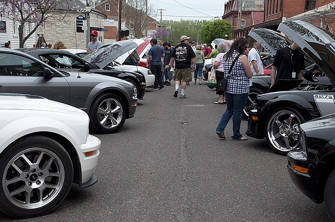 Spectators and car owners line the streets to take in the sights at the 8th annual Shelbyfest in Hermann.