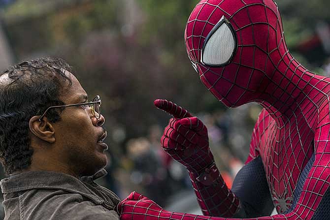 This image released by Sony Pictures shows Jamie Foxx, left, and Andrew Garfield as Spider-Man in "The Amazing Spider-Man 2."