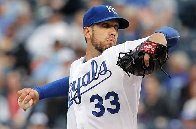 Kansas City Royals starting pitcher James Shields delivers to a Detroit Tigers batter during the first inning of a baseball game at Kauffman Stadium in Kansas City, Mo., Friday, May 2, 2014.