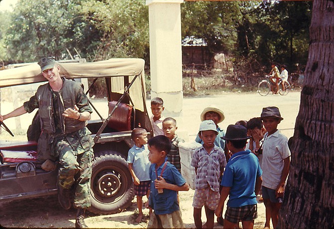 Bernie Plassmeyer is seen with kids in Vietnam, circa 1970. Plassmeyer was among those honored April 25 at Marine Corps Base Quantico near Triangle, Va.