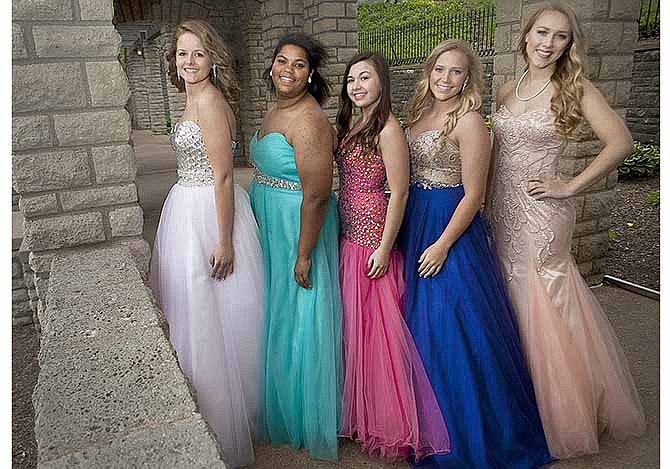 From left, Kyli Runzi, Ellanie Jamison, Carley Baker, Allyson Metz and Claire Ryan pose for their portrait after the girls were voted to the Jefferson City High School Prom Court. Baker was named prom queen.