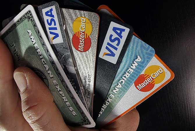 Consumers increased their borrowing in March by the largest amount in more than a year, using their credit cards and taking out more auto and student loans, according to data released by the Federal Reserve on Wednesday, May 7, 2014.