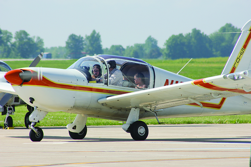 Bianca English, Zoey English and Lilly Barrioz prepare for takeoff at the 2013 Kingdom Pilots' Association's annual Fly-In Breakfast. The breakfast returns May 17.