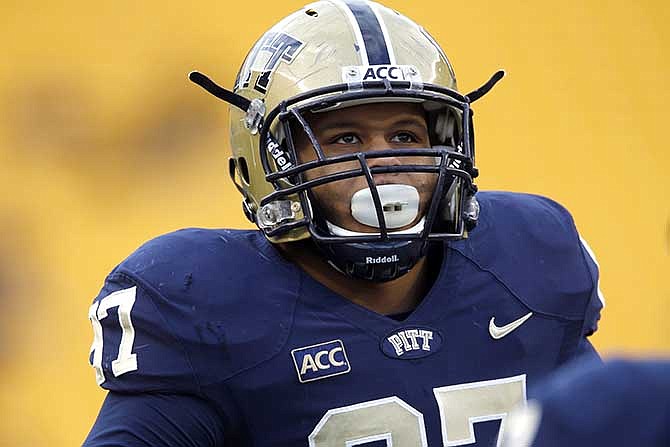 In this photo takenon Nov. 29, 2013, Pittsburgh defensive lineman Aaron Donald warms up before an NCAA football game against Miami in Pittsburgh. 