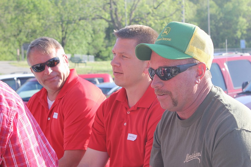 Street Department Supervisor Gary Felkner, right, talks with Assistant City Engineer Kyle Brenner and City Engineer Greg Hayes Friday during the city of Fulton's annual city picnic. Felkner was named the city's Employee of the Year, earning praise from city officials for his hard work and professionalism.