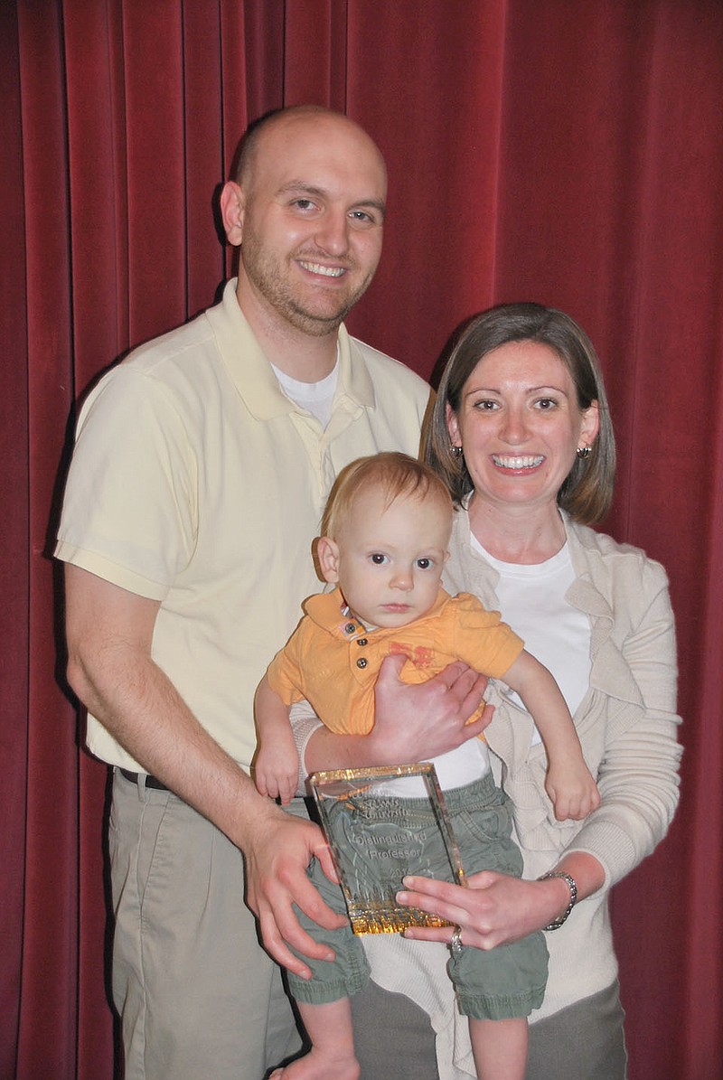 William Woods University professor Caroline Boyer Ferhat with her husband, Mike Ferhat, and son, Emmett after receiving the Louis D. Beaumont Dad's Association Distinguished Professor Award for Excellence in Teaching. Award candidates are nominated and voted on by students.