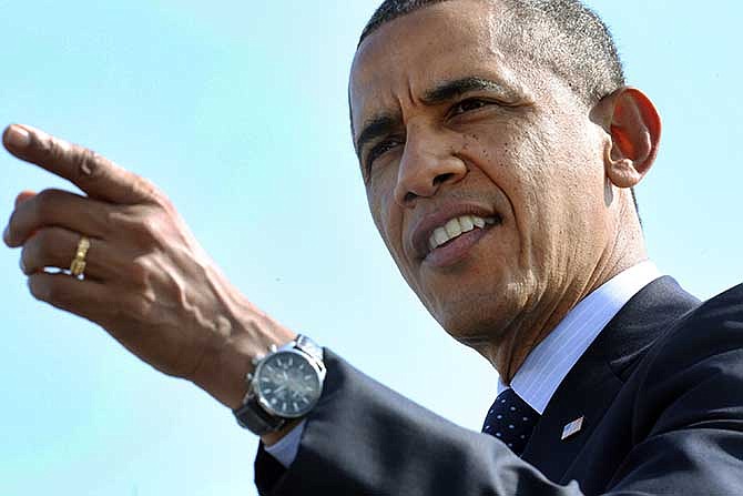 President Barack Obama speaks to the media at the Washington Irving Boat Club in Tarrytown, N.Y., Wednesday, May 14, 2014. The President spoke about the need for Congress to fund road and bridge improvements across the nation.