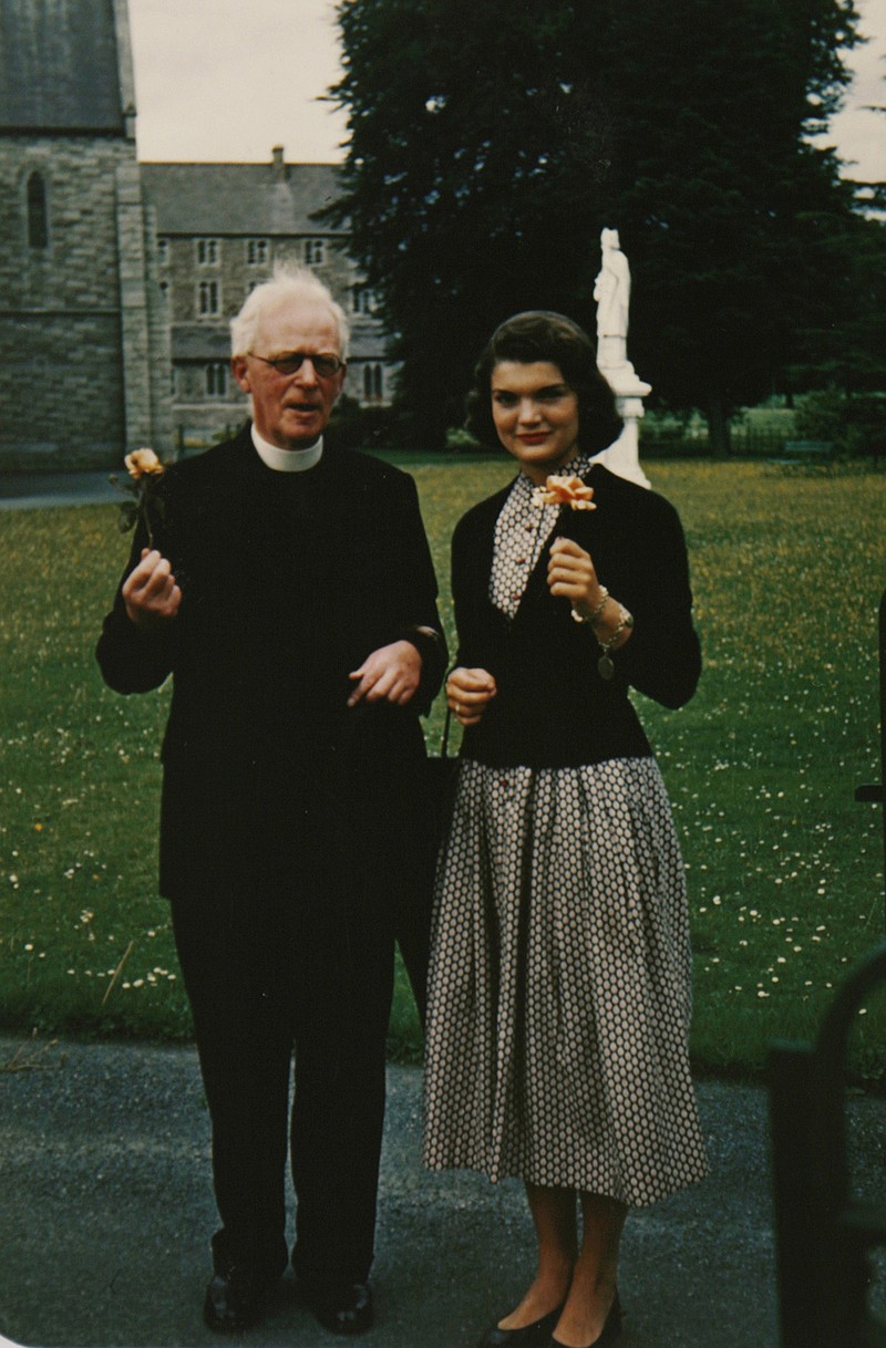 In this image made available by Sheppard's Irish Auction House shows Rev. Joseph Leonard with Jacqueline Kennedy at All Hallows College in Dublin, Ireland, in 1950. Letters written by Kennedy to the Irish priest have revealed new details about her closely guarded private thoughts. The letters are set to be auctioned next month and could fetch as much as $1.6 million. 