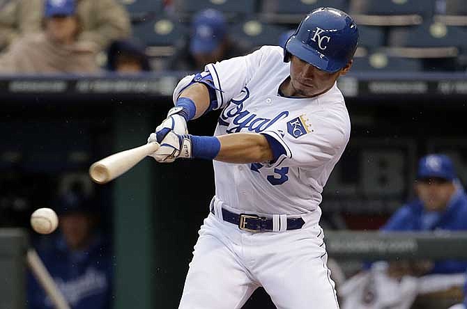 Kansas City Royals' Norichika Aoki hits a double during the first inning of a baseball game against the Baltimore Orioles on Friday, May 16, 2014, in Kansas City, Mo. 