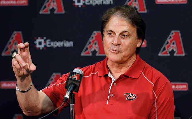 Tony La Russa, newly hired as chief baseball officer for the Arizona Diamondbacks, speaks to reporters after being introduced Saturday, May 17, 2014, in Phoenix.