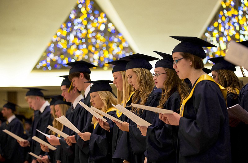 Helias graduating seniors sing during the graduation mass Sunday afternoon at the Cathedral of Saint Joseph. 