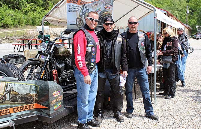 Eldon Noble Eagles Greg Sullens, Craig Brodecker and Dave Devine prepare for the Mid Coast Bike Run festivities at Camp Bagnell Saturday morning.
