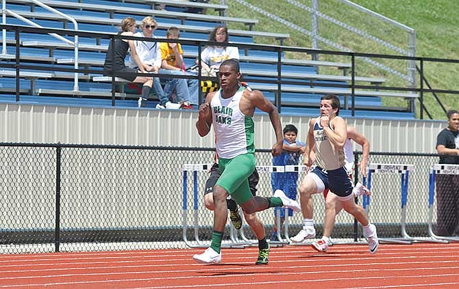 Dominic Jamerson of Blair Oaks sprints toward the finish line the boys 100-meter dash Saturday in the Class 3 District 5 meet in Washington, Mo.