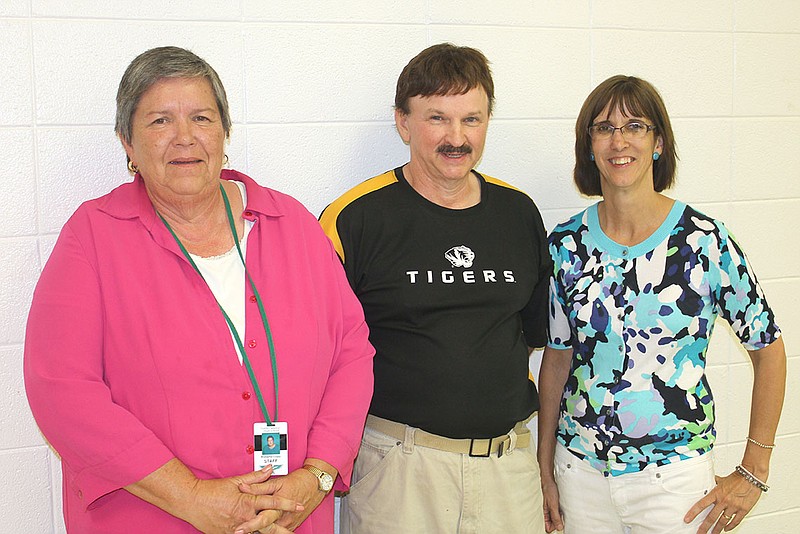 (From left) Roberta Cupp, David Karns and Kristi DeForest are retiring from North Callaway R-I Schools after a combined 67 years with the district. The three were guests of honor at a dessert reception at the high school Tuesday afternoon and later were honored during the school board meeting.