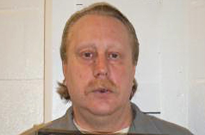 In this Feb. 9, 2014 file photo provided by the Missouri Department of Corrections is Russell Bucklew who is scheduled to die for killing a romantic rival as part of a crime spree in southeast Missouri in 1996.