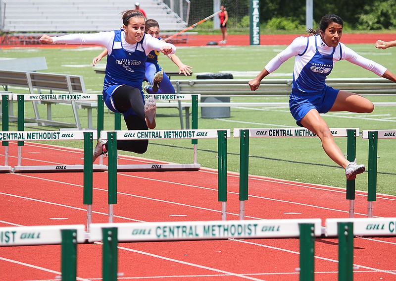 Jamestown sophomore Mickayla Strother, at left, competes in the 100 Meter Hurdles event Saturday at Class 1 Sectionals at Fayette.
