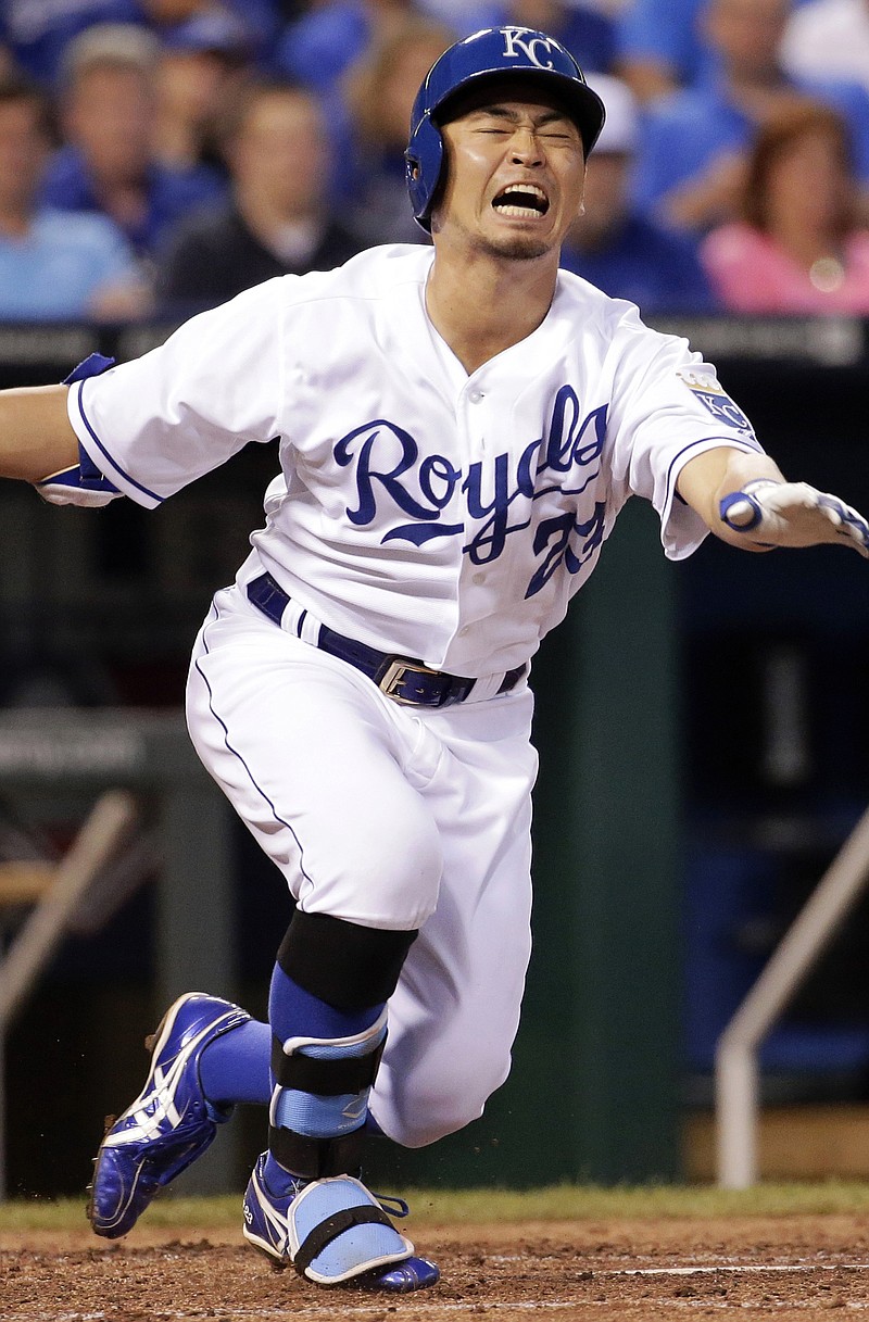Nori Aoki of the Royals grimaces after hitting a foul ball off off his leg during the fourth inning of Monday night's game against the White Sox at Kauffman Stadium.