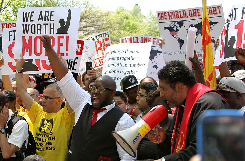 
Hundreds of protesters flooded the streets Wednesday near the McDonalds Corp. headquarters in Oak Brook, Ill. railing about low wages and seeking $15 per hour for the rank and file. 