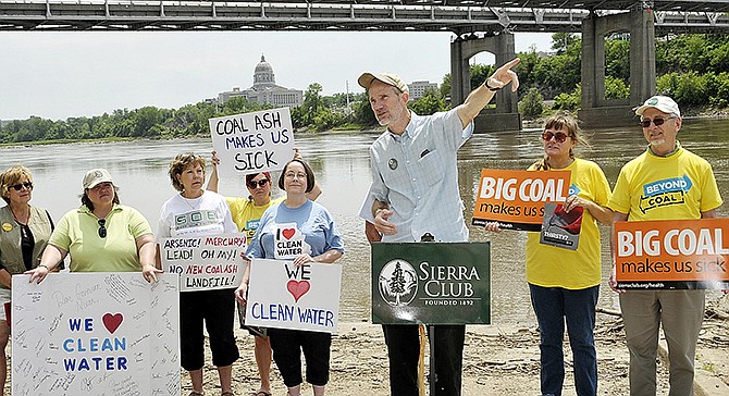 John Hickey, of Sierra Club Missouri Chapter, and representatives from other groups announce at Noren River Access on Thursday they will be calling for water protections from toxic coal ash. 